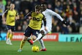 LIVELY: Leeds United loanee Lewis Bate gets away from Arsenal and England star Bukayo Saka in Monday night's third round FA Cup clash between his loan side Oxford United and the Gunners at the Kassam Stadium. Photo by Catherine Ivill/Getty Images.