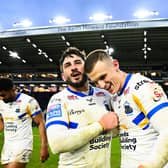 Jack Bird, left and Ash Handley celebrate Leeds Rhinos' win against Warrington Wolves. Picture by Olly Hassell/SWpix.com.