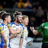Referee Chris Kendalll explains a decision to Leeds Rhinos' Brodie Croft, James Bentley and Lachie Miller. Picture by Allan McKenzie/SWpix.com.