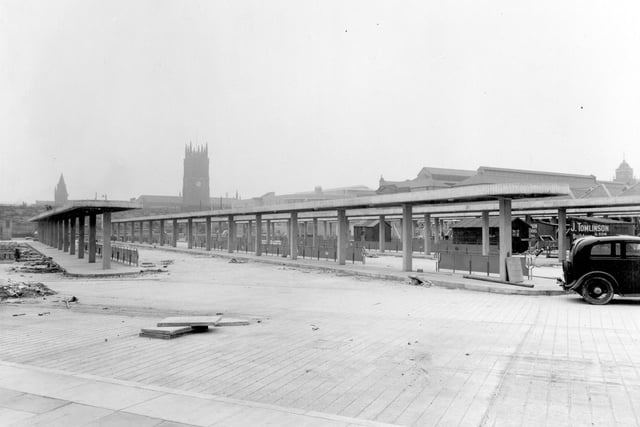 Central Bus Station, view of bus stands as the construction work near completion. Leeds Parish Church can be seen, on the right, part of the roof of Kirkgate Market building