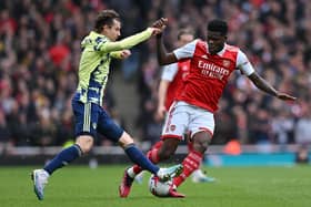 VOW: From Leeds United's Brenden Aaronson, left, pictured challenging Arsenal's Thomas Partey in Saturday's 4-1 defeat at the Emirates. 
Photo by GLYN KIRK/AFP via Getty Images.