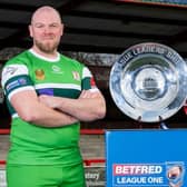 Hunslet captain Steve Crossley with the League One trophy at this week's lower divisions season launch. Picture by Allan McKenzie/SWpix.com.