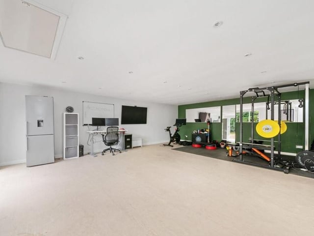 The studio, currently in use as a home office and gym.