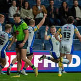 Harry Newman, second from right, celebrates his try for Leeds Rhinos against Warrington Wolves. Picture by Bruce Rollinson.