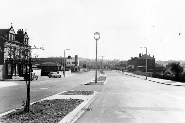 September 1955. Completed Cross Gates Bridge on Station Road. New central reservation with electric streetlight fittings. Hotel, Tetley's pub, Cross Gates Station and Ritz cinema on left.