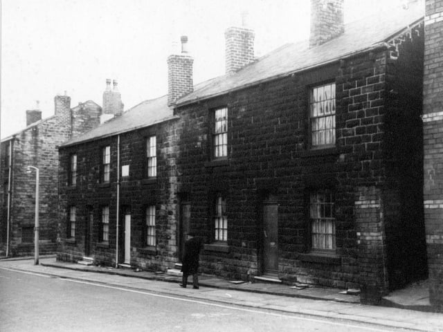 A man walks along Wesley Street looking towards Cross Street. Pictured in March 1967.
