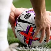 WOLVERHAMPTON, ENGLAND - MARCH 18: A detailed view of the Nike Flight Aerowsculpt Hi-Vis Premier League match ball during the Premier League match between Wolverhampton Wanderers and Leeds United at Molineux on March 18, 2023 in Wolverhampton, England. (Photo by Naomi Baker/Getty Images)