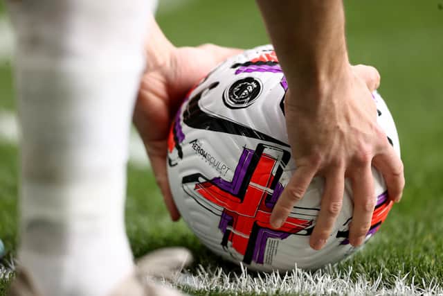 WOLVERHAMPTON, ENGLAND - MARCH 18: A detailed view of the Nike Flight Aerowsculpt Hi-Vis Premier League match ball during the Premier League match between Wolverhampton Wanderers and Leeds United at Molineux on March 18, 2023 in Wolverhampton, England. (Photo by Naomi Baker/Getty Images)