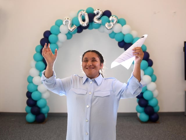 Juwairia Junaid from Leeds, who is totally blind, celebrates passing her exams.