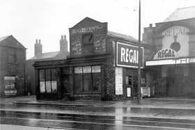 Regal cinema, formerly called the Pavillion, on Low Road pictured in July 1935. On the left is the entrance to Organ Yard.  Premises on left is formerly Whitehall garage.