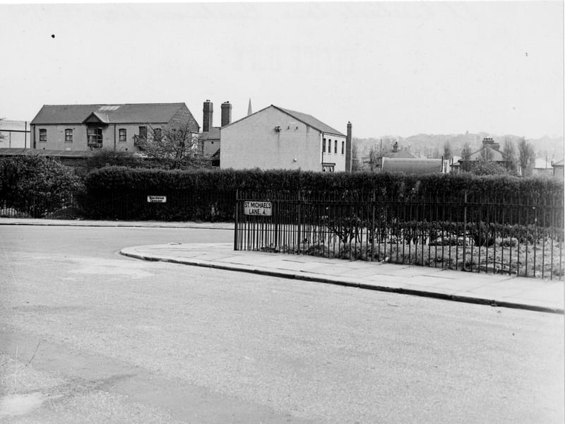 The junction of St. Michael's Lane and Beechwood Crescent. The edge of an allotment site can be seen on the left with houses in the background. Pictured in August 1949.