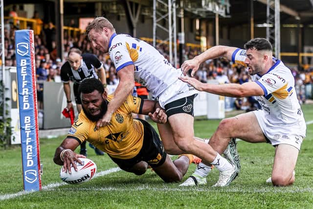 Mikaele Ravalawa seen scoring in Castleford Tigers' win aganst Leeds Rhinos two weeks ago. Picture by Simon Hall/SWpix.com.
