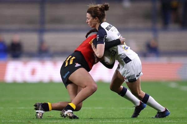 England's Courtney Winfield-Hill, the Leeds Rhinos captain, takes on Papua New Guinea's Sera Koroi. Picture by John Clifton/SWpix.com.