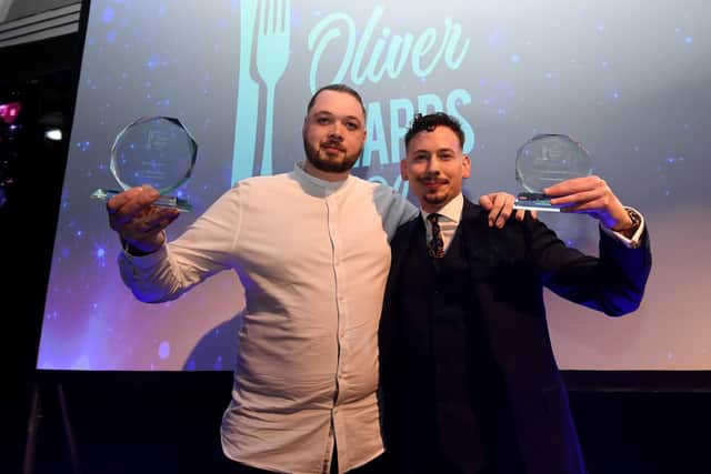 Chef Jono with his two Oliver Awards at the 2022 ceremony