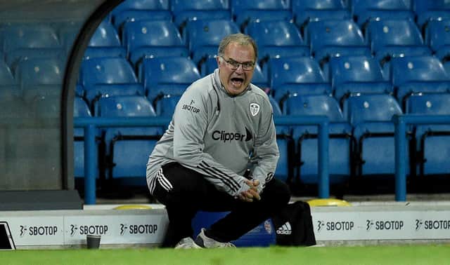 LEEDS, ENGLAND - SEPTEMBER 16: Marcelo Bielsa, Manager of Leeds United gives his team instructions during the Carabao Cup Second Round match between Leeds United and Hull City at Elland Road on September 16, 2020 in Leeds, England. (Photo by Oli Scarff - Pool/Getty Images)