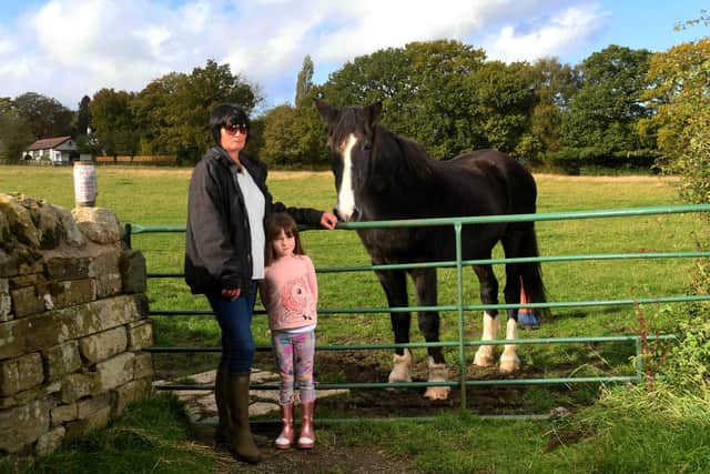 Emma Richmond, pictured with her daughter Alice, 6, and horse, Magic. (Pic: Simon Hulme)