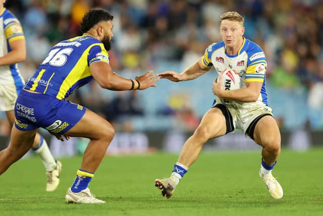 Lachie Miller on the ball for Leeds Rhinos against Warrington Wolves at Magic Weekend. Picture by John Clifton/SWpix.com.