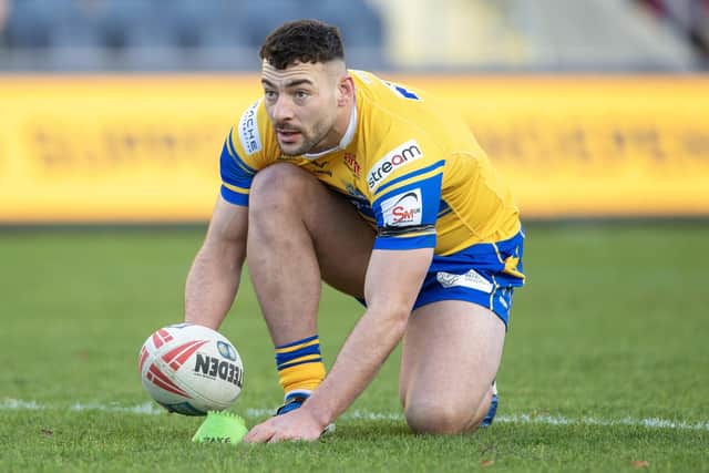 Leeds Rhinos' Jake Connor lines up a kick during the 2025 season. Picture by Tony Johnson.
