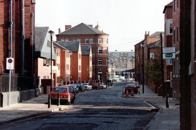 The Calls on to Crown Point Road, with Howarth Timber, timber merchants and Saxton Gardens flats visible.