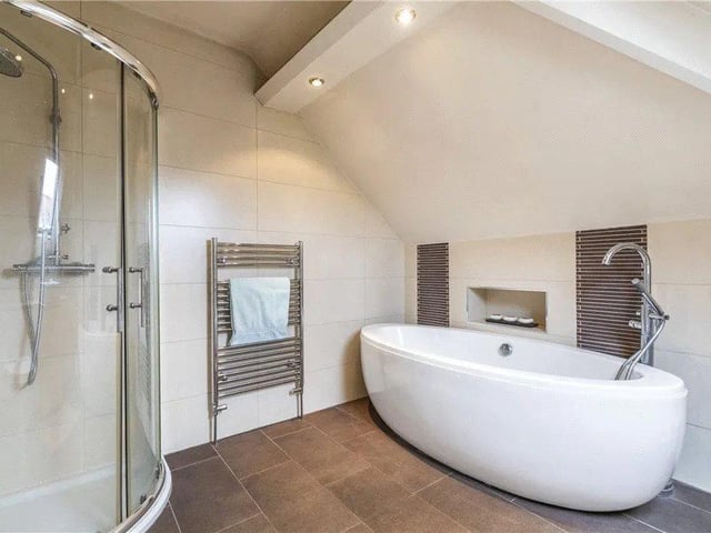 There are two further large bedrooms, a study and a bathroom to the upper storey.