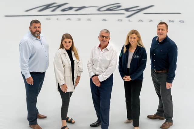 DONE DEAL: (from left) - Morley Glass's Chris MacMillan, Charlotte Gilbert, managing director Ian Short and Jessica Owens, hit centre ice with Leeds Knights' managing director Warwick Andrews (right).