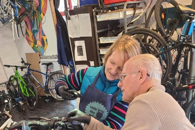 Students on a bike maintenance course