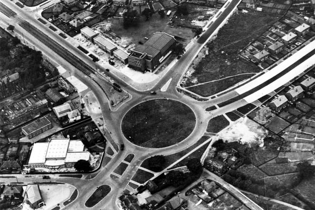 An aerial view of the junction of Cross Gates Ring Road (running from bottom left to mid-right), Cross Gates Road (top left), and Cross Gates Lane (top right), looking north-west. The Regal Cinema is at the junction of the latter two roads. Crossgates Library can be seen at the junction of the Ring Road and Farm Road (bottom left).
