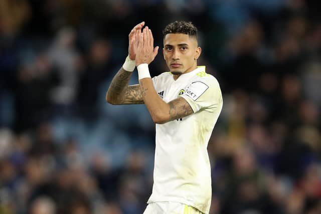 LEEDS, ENGLAND - JANUARY 22: Raphinha of Leeds United applauds fans after their sides defeat during the Premier League match between Leeds United and Newcastle United at Elland Road on January 22, 2022 in Leeds, England. (Photo by George Wood/Getty Images)