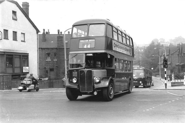 AEC Regent 111/Roe 602 (1950) at the junction of Harehills Lane and Roundhay Road which is to the right in this view. It is the no. 44 route to Halton Moor, registration no. NUB 602. On the left is the business of David Crawford, decorator. Taken in June 1966.