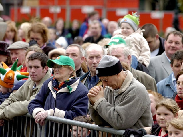 The annual St Patrick's Day Parade through Leeds city centre, on March 14, 2004. Pictured are hundreds of on-lookers taking part in the one-minute silence at the start of the Irish festival.
