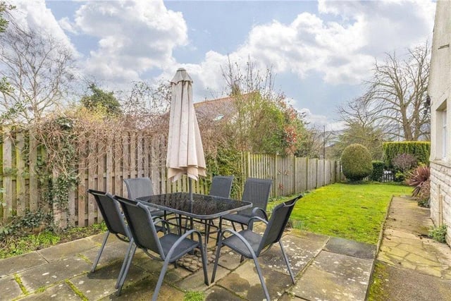 Outside there is a superbly topiaried garden with space for outdoor furniture.