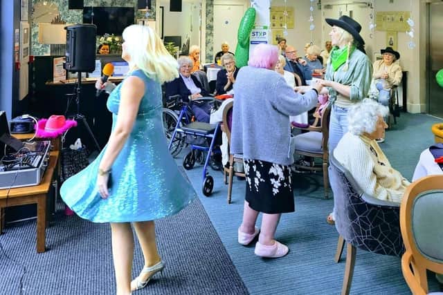 Residents and Colleagues enjoying the country and music performance
