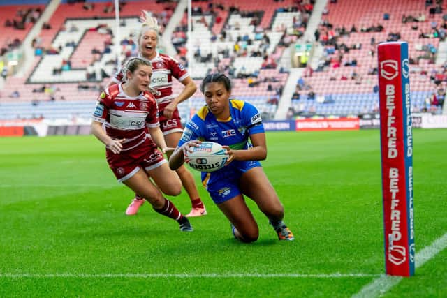 Leeds Rhinos' Sophie Robinson scores the second of her two tries in Friday's win at WIgan Warriors. Picture by Allan McKenzie/SWpix.com.