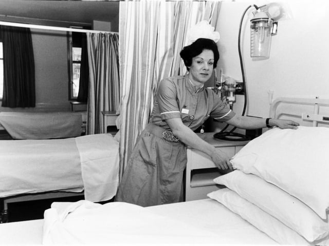 Ward sister Anne-Marie Butterfield prepares a bed for her first patient at the newly-opened Clarendon Wing at Leeds General Infirmary in November 1983.