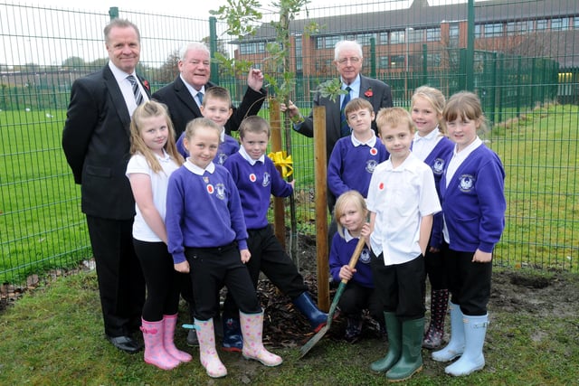 Hebburn Lakes Primary school council plant a oak tree at the back of the school. From left headteacher Tony Watson with coun Jim Sewell and Alan Kerr