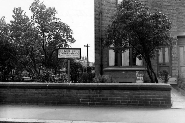 Austhorpe Road in July 1948.  In focus is the sign and premises of Bulmer Bros. Joiners and builders.