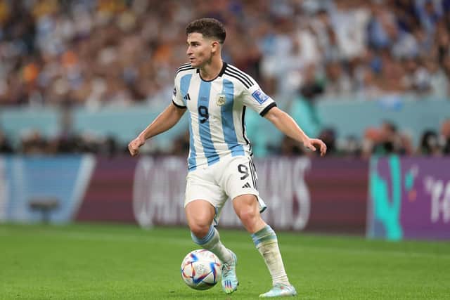 LAST-MAN STANDING: Manchester City forward Julian Alvarez with Argentina. Photo by Catherine Ivill/Getty Images.