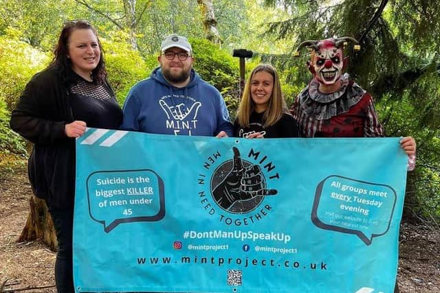 Members of the Scare Trail organising team with MINT workers along with one of the Unfriendly Clowns who may be making an appearance