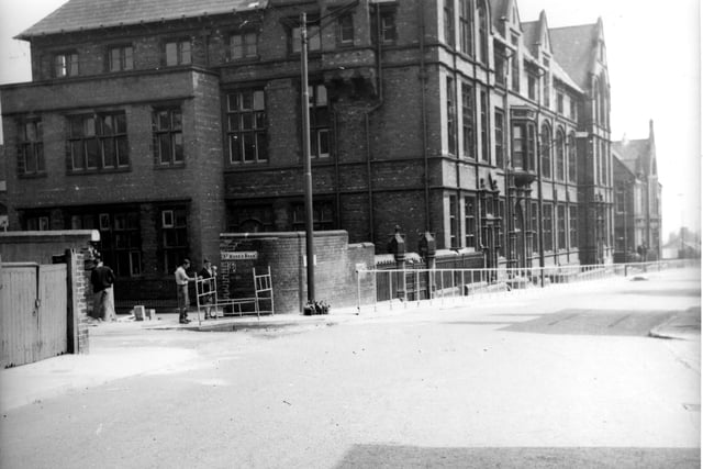 Blenheim Walk showing Blenheim School. This had previously been the Leeds School for the Deaf and Blind. The site is now taken up by Leeds College of Art and Design. The junction with St. Mark's Road is on the left. Pictured in July 1966.