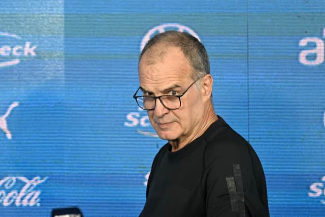 Argentine Marcelo Bielsa arrives for his presentation as coach of the Uruguayan national football team, at the Centenario Stadium in Montevideo, on May 17, 2023. Marcelo Bielsa was named coach of Uruguay on May 15, with the task of taking them to the 2026 World Cup. (Photo by Pablo PORCIUNCULA / AFP) (Photo by PABLO PORCIUNCULA/AFP via Getty Images)