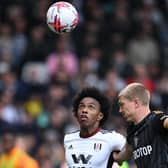 NIGHTMARE: For Leeds United's Rasmus Kristensen, right, taken to the cleaners by Fulham's Brazilian winger Willian, left, at Craven Cottage.
Photo by JUSTIN TALLIS/AFP via Getty Images.