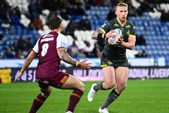 Mikolaj Oledzki carries the ball during Leeds Rhinos' win at Huddersfield Giants last Friday. Picture by Olly Hassell/SWpix.com.