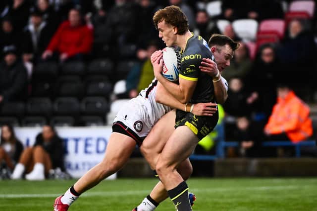Fergus McCormack (with ball in hand) made his Leeds Rhinos debut during the Challenge Cup win at Widnes Vikings three months ago. Picture by Olly Hassell/SWpix.com.