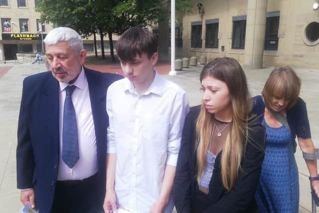 Dinos Constantinou (Eileen's father) and Joel and Carita Barrott (Eileen's children) outside Bradford Crown Court today.