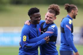 Bukayo Saka and Kalvin Phillips. (Photo by Catherine Ivill/Getty Images)