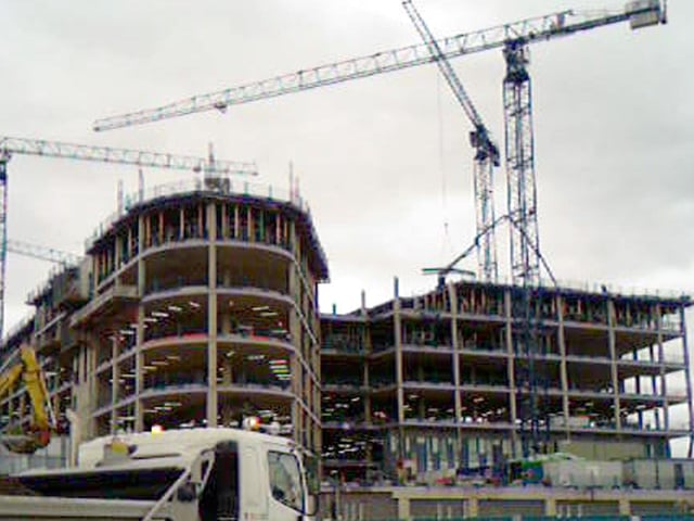 Construction of the new Bexley wing at St. James's Hospital in January 2006. It houses one of the country's largest cancer centres, the St. James's Institute of Oncology. The Bexley Wing was built at a cost of £220 million including specialist equipment. It opened in December 2007, welcoming the first patient on Christmas Eve. The Bexley wing provides 350 inpatient beds and employs 1,600 staff.
