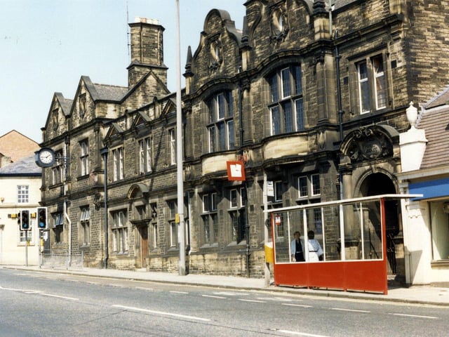 Harrogate Road showing Chapel Allerton Branch Library in the centre, with the Police Station and Midland Bank to the left and The Leeds Building Society partly visible on the right. A bus shelter is seen in front of the library.