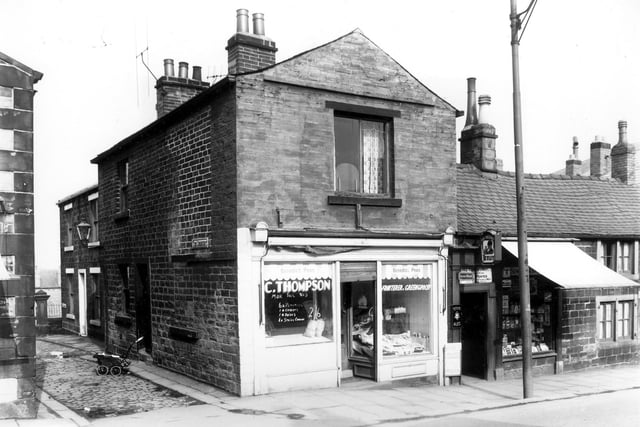 A view of Upper Town Street showing the junction with The Crescent (left) a narrow street leading to Moriah Methodist Chapel and Sunday School. Number 6, The Crescent can be seen - (the white painted door surround beyond the pram on the cobbles). C. Thompson, fruiterer and greengrocer is at number 222 Upper Town Street and Fred Hemingway, off licence occupies numbers 218. Pictured in April 1960.