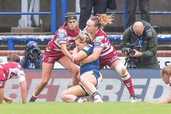 Rhinos' Amy Hardcastle's try opened the scoring in the Women's Challenge Cup semi-final against WQigan. Picture by Allan McKenzie/SWpix.com.