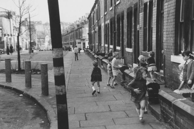 Children play on Burley Lodge Road in October 1970.